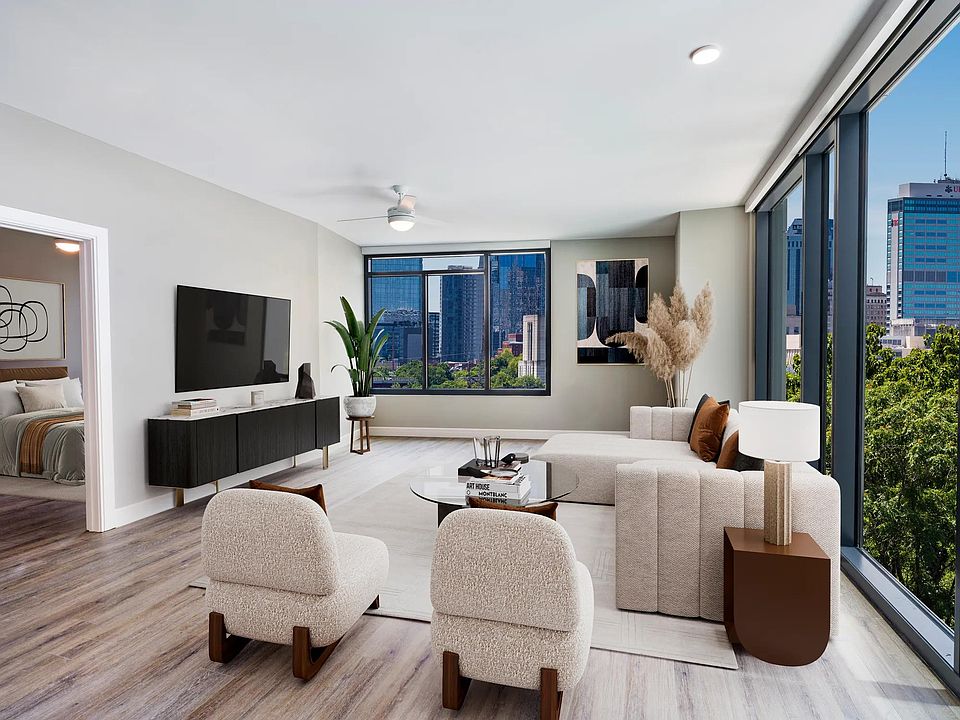 Choose homes with floor-to-ceiling windows that showcase downtown Nashville views, enhancing every moment at Modera McGavock with natural light and modern elegance.