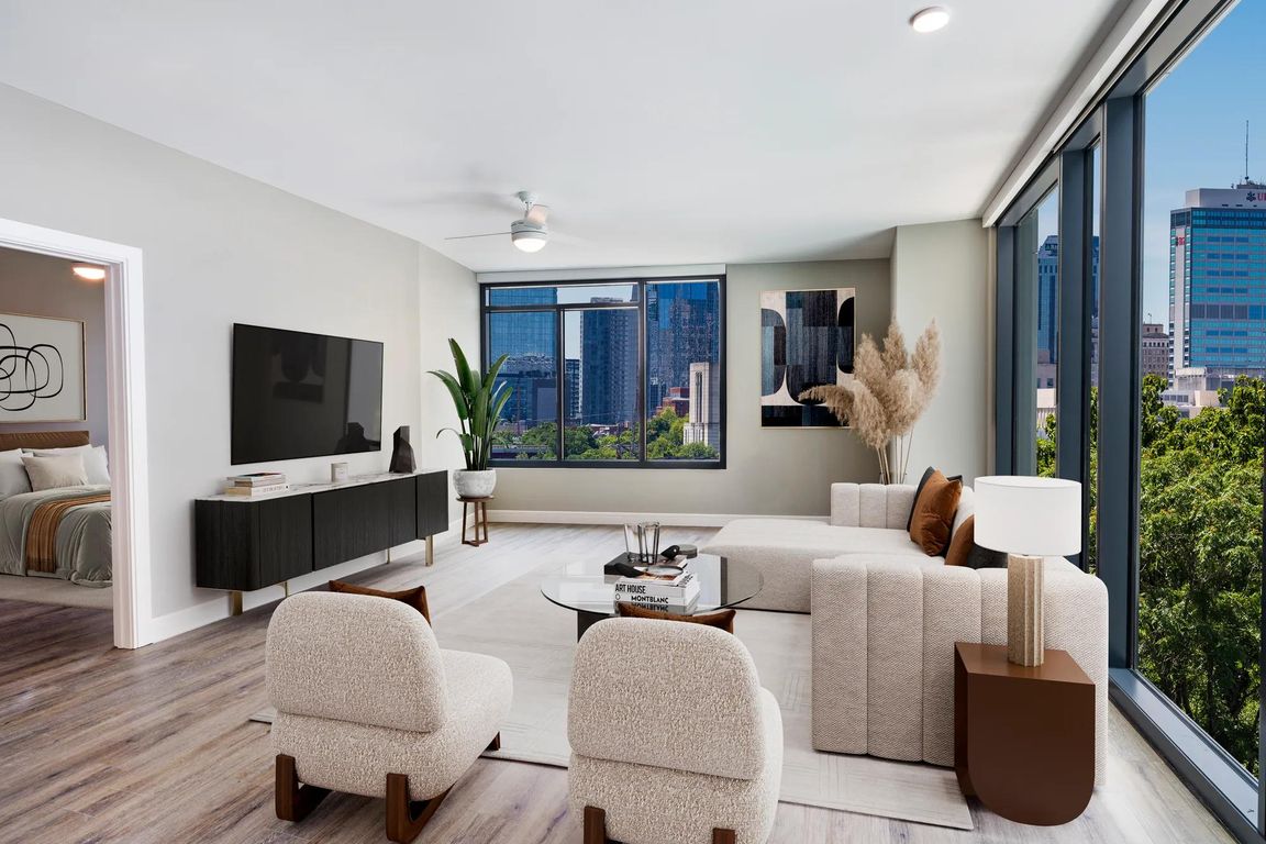 Choose homes with floor-to-ceiling windows that showcase downtown Nashville views, enhancing every moment at Modera McGavock with natural light and modern elegance.