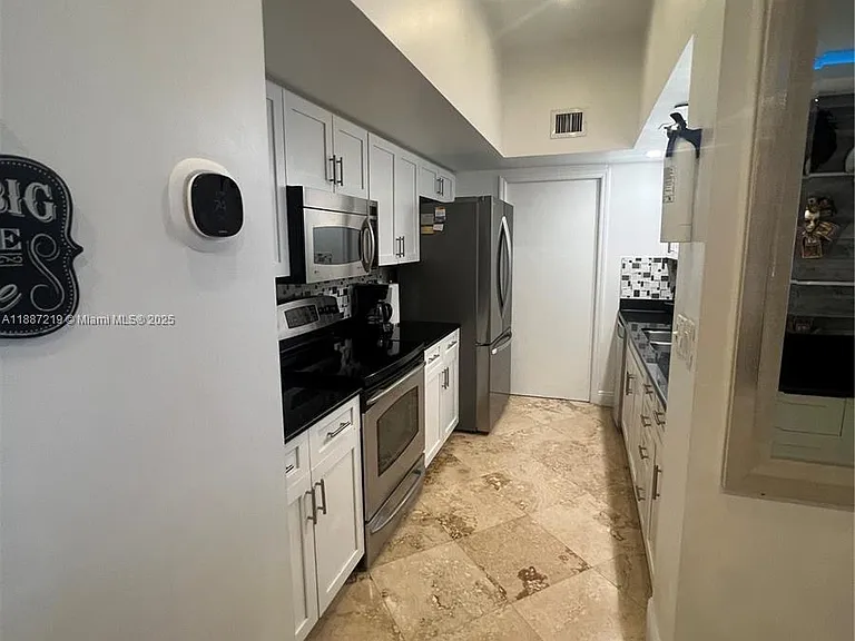 6917 Collins Ave — Photo 36