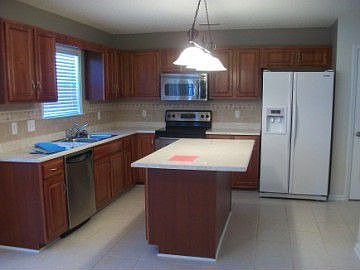 http://www.propertyboss.net/CustomerImages/SWEYER_71385/media/Properties/7317%20Grizzly%20Bear%20Cou