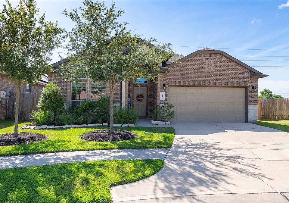 Come discover a wonderful three bedroom home filled with upgrades--from hardwood & tile flooring, extensive trimwork to island kitchen--it is all here!