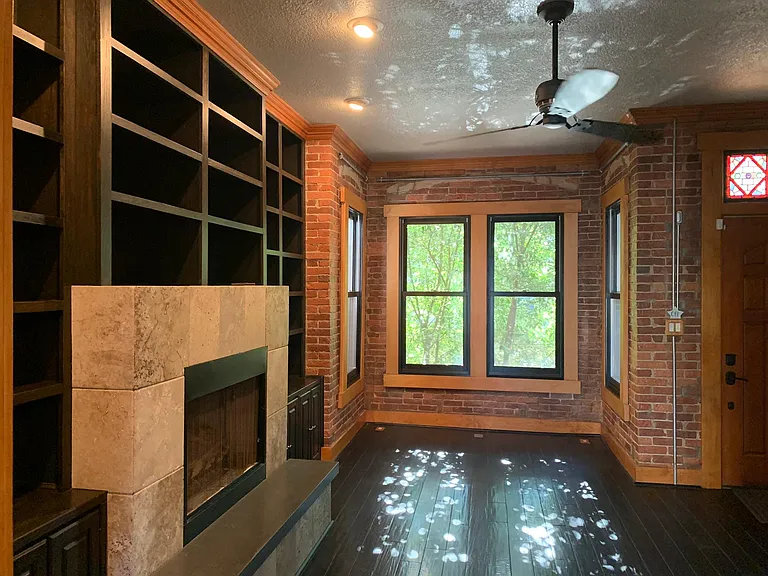 Living Room (main level). Bay window area will fit standard size sofa or dining table.