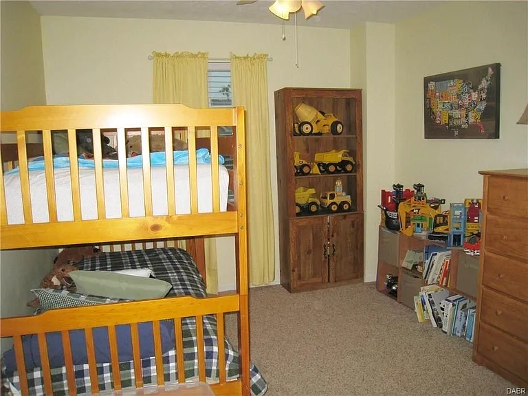 1 of the 3 approval bedrooms upstairs. Each bedroom has its own ceiling fan and closet space!