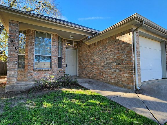 View of house from street corner