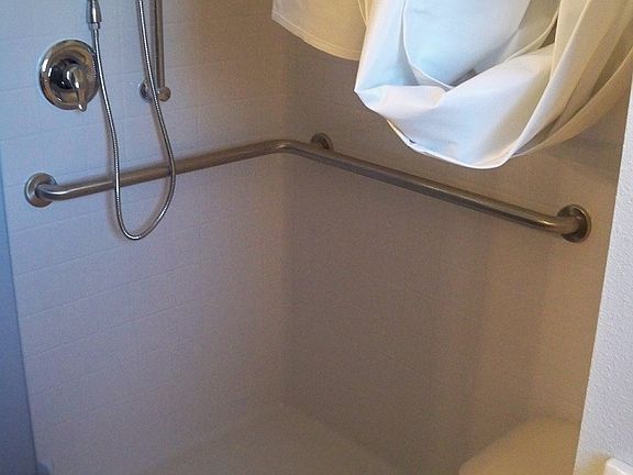 Roll-in, no-step shower/ with bench