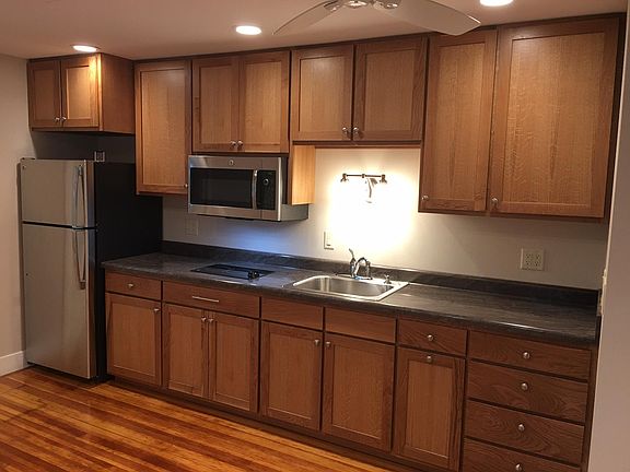 Quarter sawn white oak custom cabinets. Cook top with combi