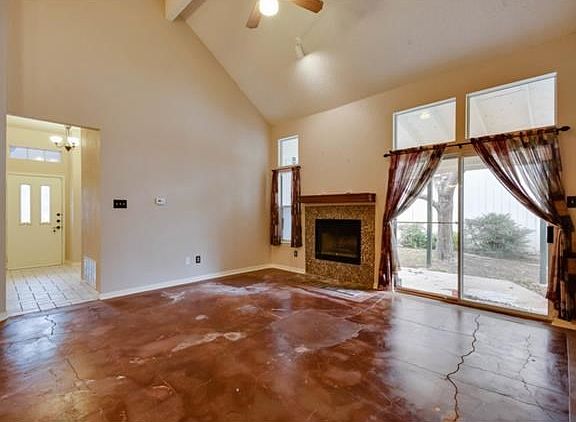 High vaulted ceilings in every room, stained concrete floori