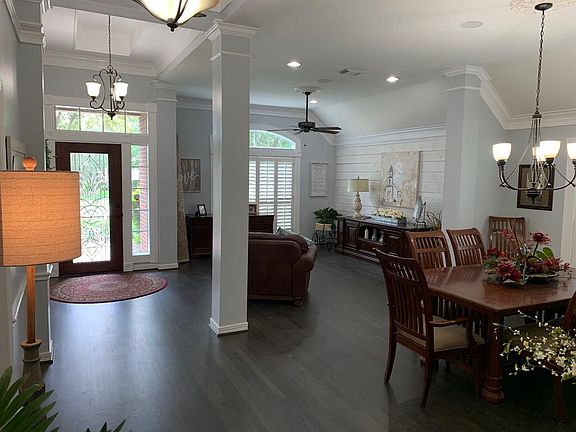 Step inside to a fresh home with many updates! Architectural details include columns, crown molding, arched windows w/crown surround and shiplap wall treatments like no other!