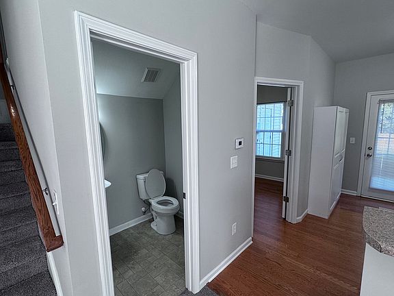 A sleek and updated half bath on the main floor, perfect for guests.