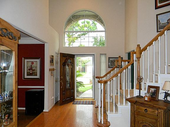 Another view of entry with wood floors.