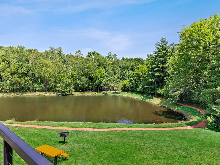 Outdoor BBQ Picnic Table & Lake | Apartments For Rent Maryland Heights Missouri | Haven on The Lake