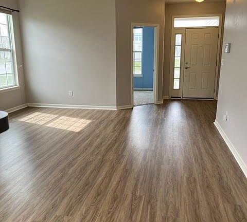 From Kitchen to front door, bedroom 3 on left