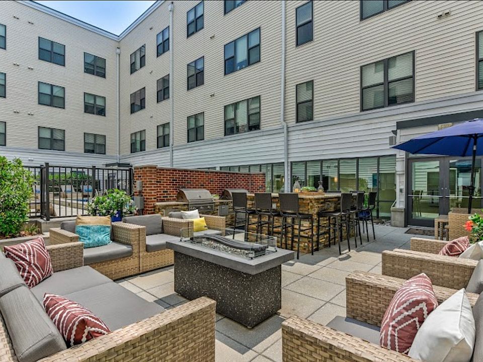 pool/ grilling area with fire pit.
on lower level.