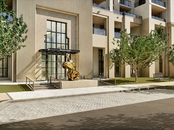 The formal entrance of Regency Parc, distinguished by the iconic sculpture of Lynda Benglis.