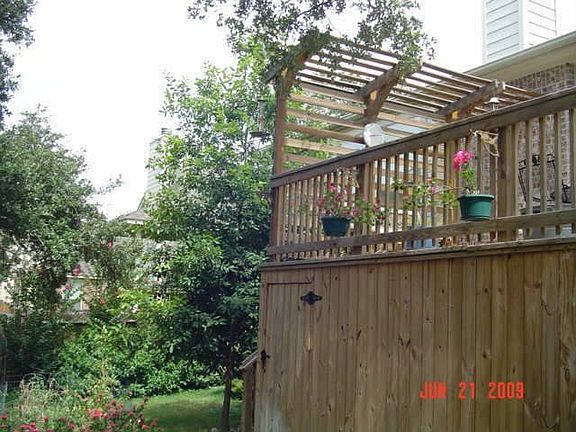 Landscape yard with deck