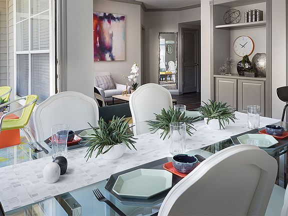 Apartment Dining and Living Room with wood floors.