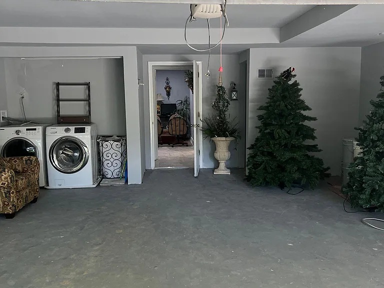 2 car garage with wash and dry machine