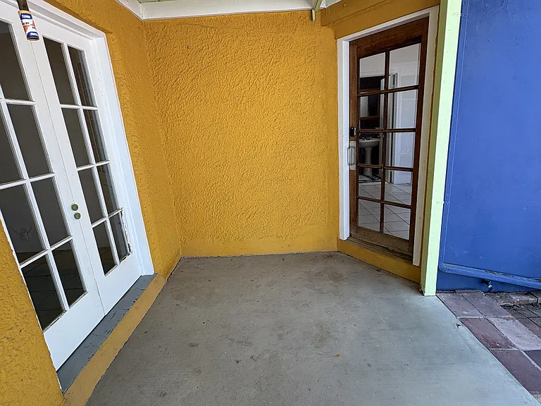 Master bedroom entry to patio