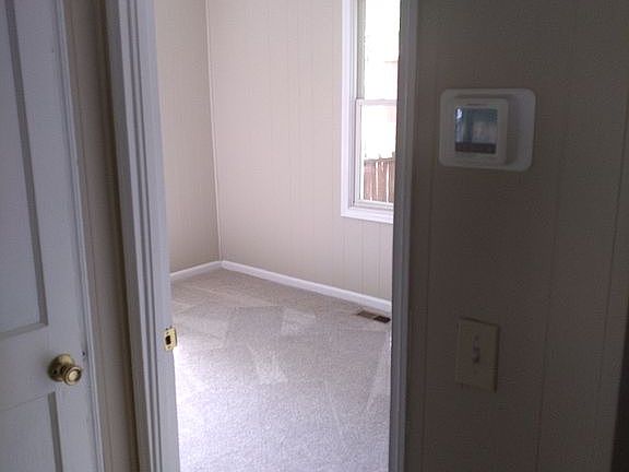 Bedroom to the right of hall