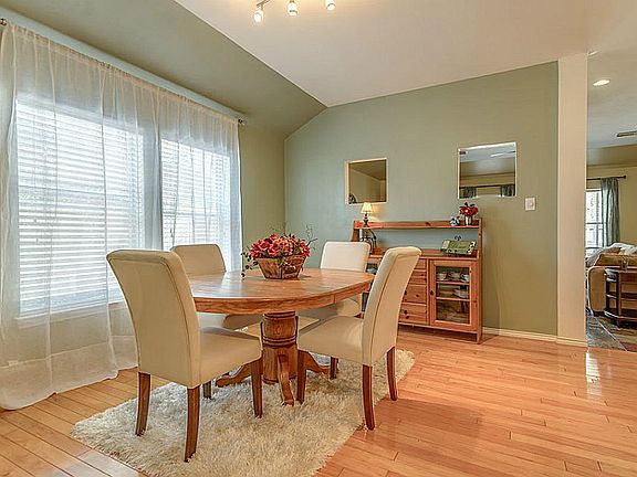 Gorgeous hardwood flooring in formal dining.