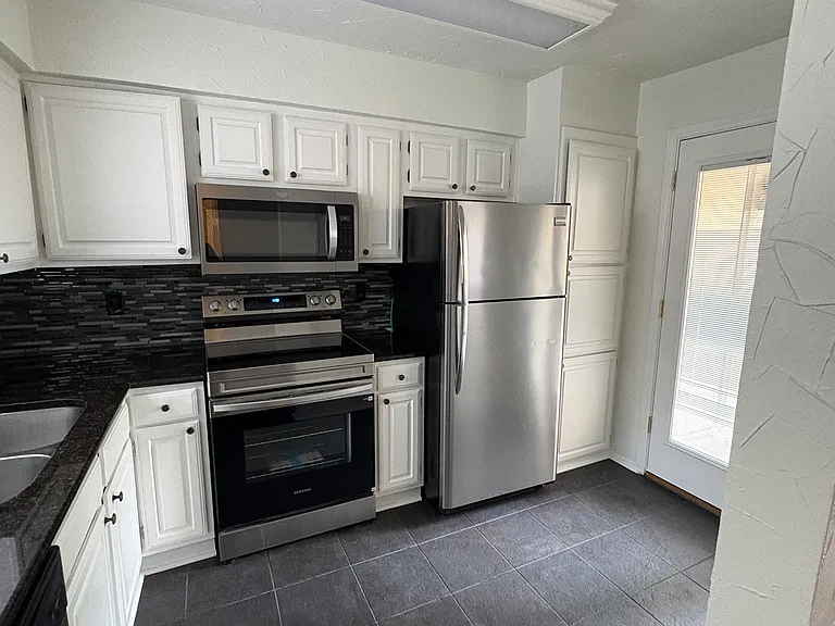 827 W Harwood Rd #E — Photo 6