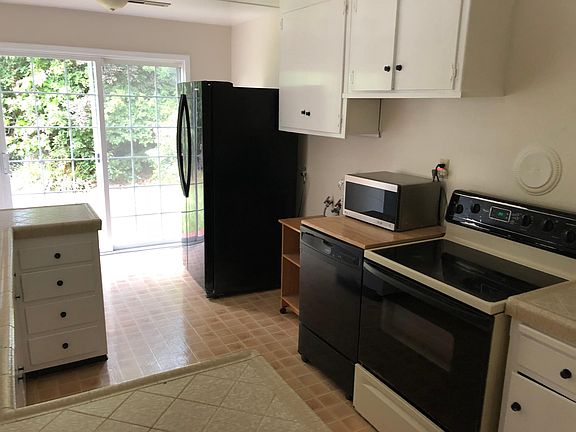Kitchen with french doors leading to the backyard