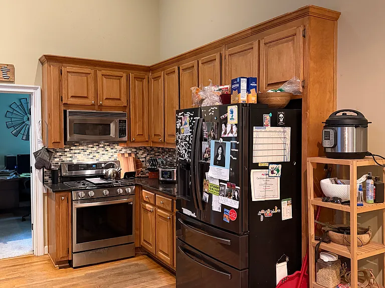 View from sunroom to kitchen