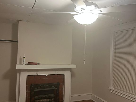 Large living room has 4 windows