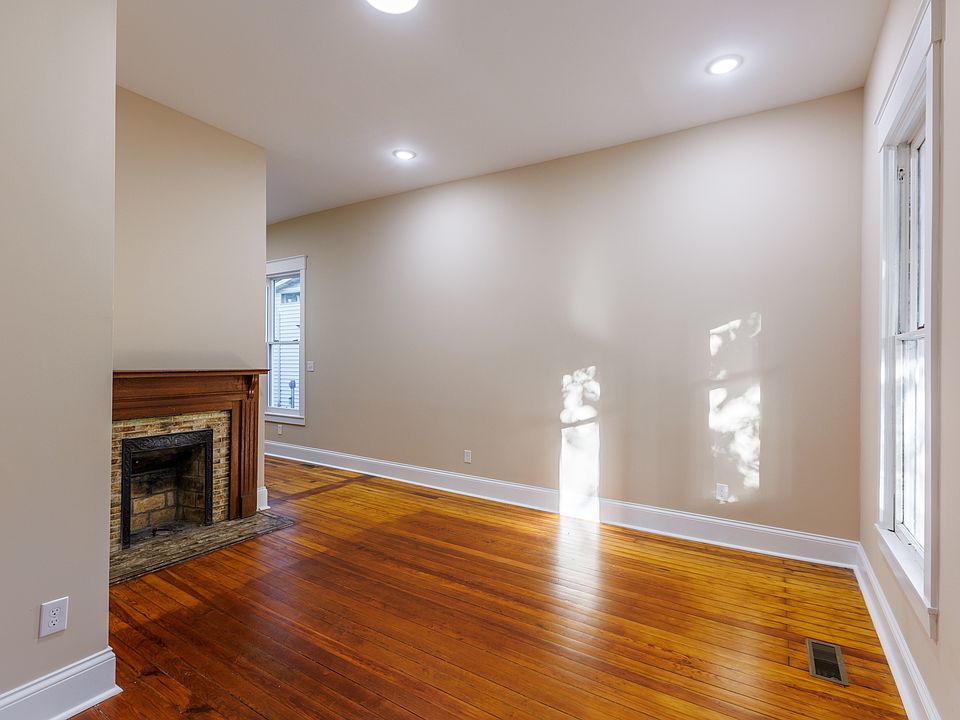 Restored original hardwood floors and 10' ceilings with an abundance of natural light.