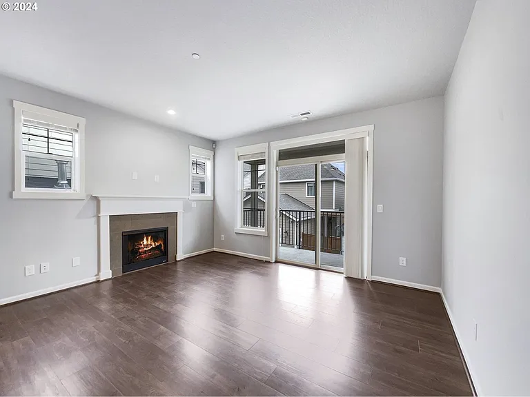 Living Area, fire place and balcony