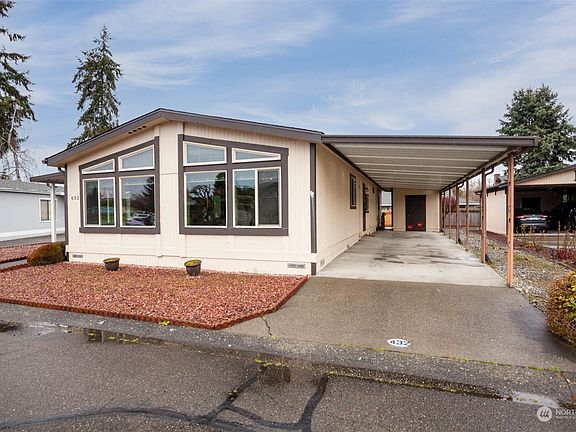 Home has a 2-car tandem carport and only 1 step into the house>