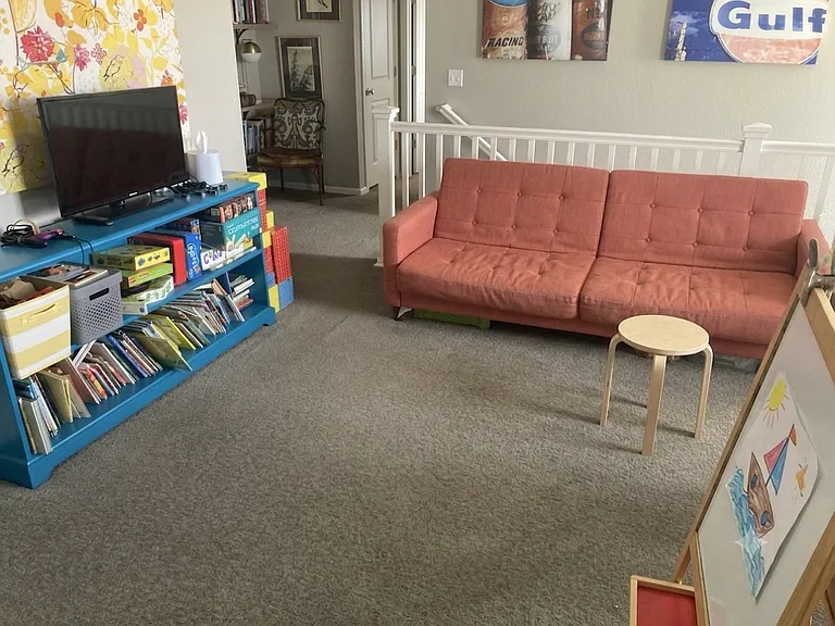 Second floor loft (between primary bedroom and bedrooms 2 and 3.