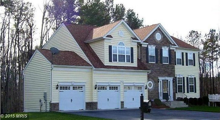 Impressive Colonial with stone and vinyl siding