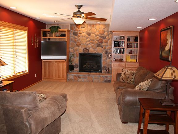 Lower Level Family Room with Stone Fireplace