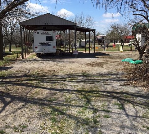 Huge lot with RV and cover