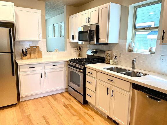 Kitchen with new paint on cabinets