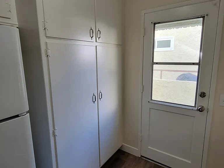 back door entrance and large pantry