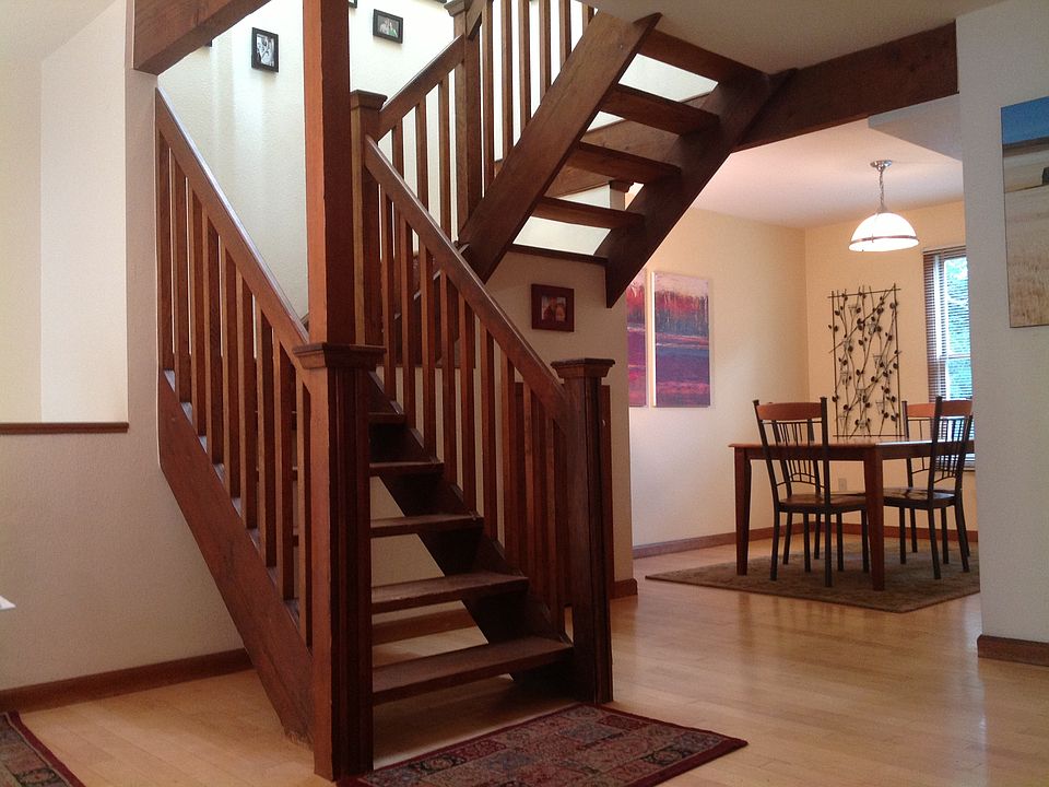 Main level includes wood floors throughout and ample light from skylights.
