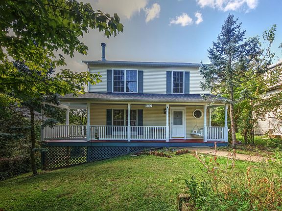 Front yard view from two car parking pad