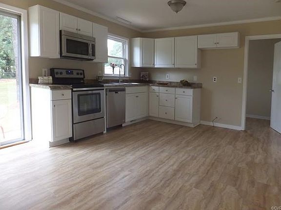 Brand new kitchen!!  New cabinets,countertop, stainless steel appliances, sink, plumbing and lighting.  The entire interior of the home has just been painted.
