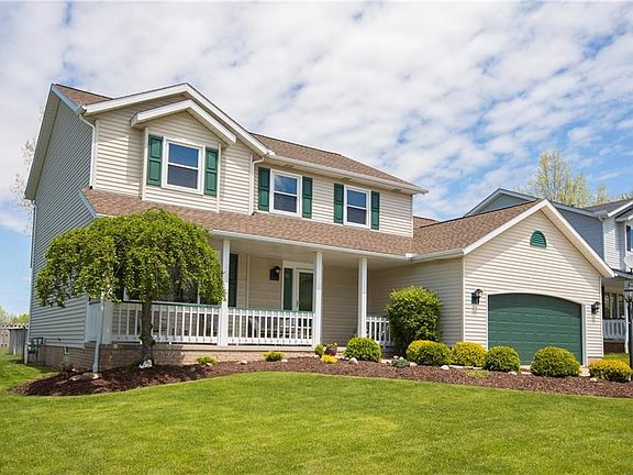 Notice the beautiful landscaping, the great condition of the exterior and the newer roof!