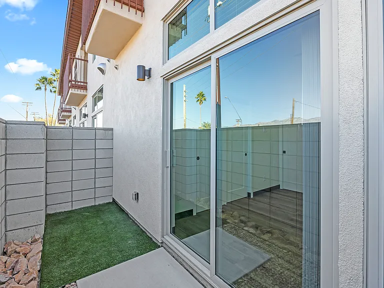 Pet friendly yards with grass on one side and rock on the other