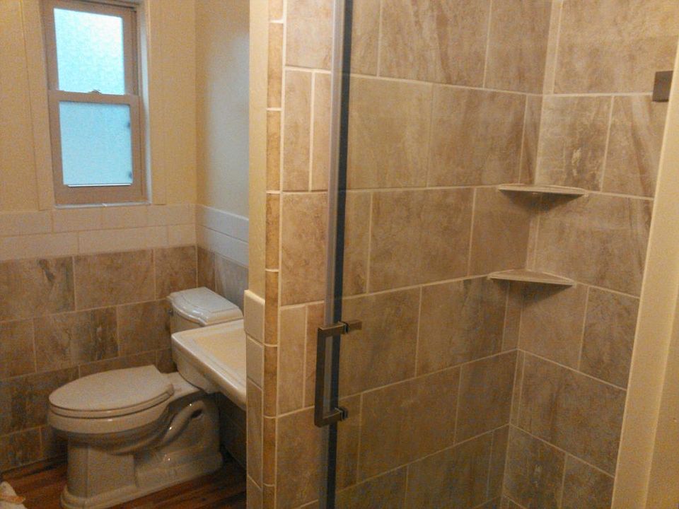 Bathroom with shower inly