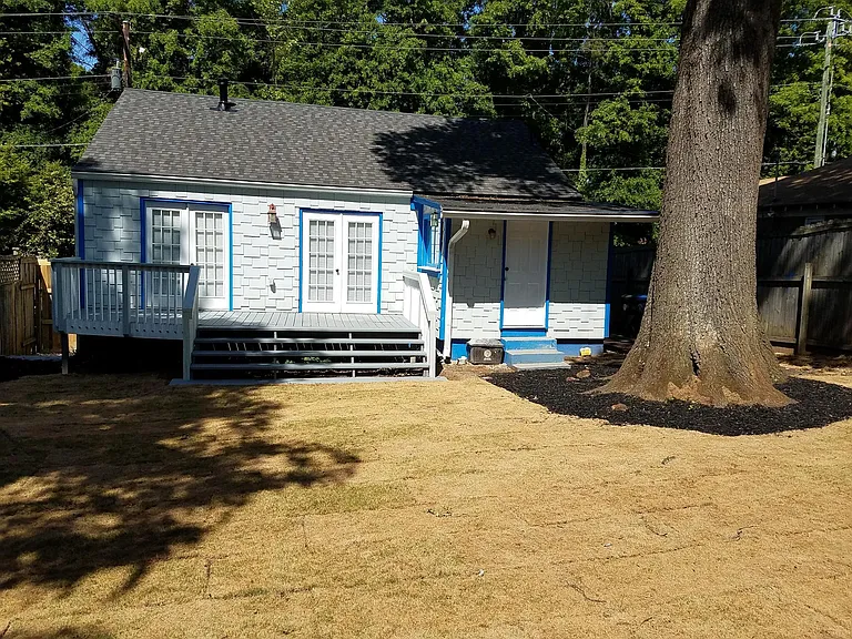At the back fence, looking at the house