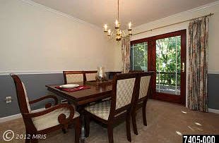 Dining room w/ Anderson door