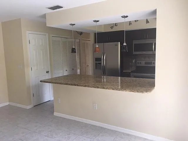 Kitchen with pantry & laundry to the side