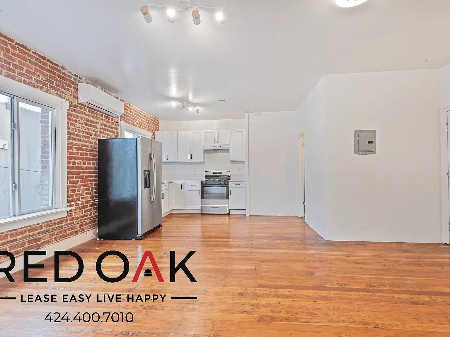 Welcoming 1-Bed with Exposed Brick and Stainless Steel Appliances ~ In Historic South-Central! — Photo 3