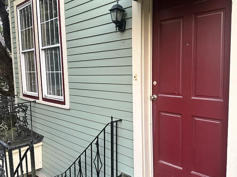 Front Door and spiral staircase down