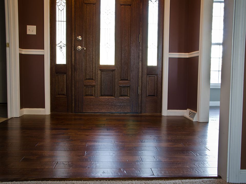 New Hardwoods in Foyer Replaced Vinyl