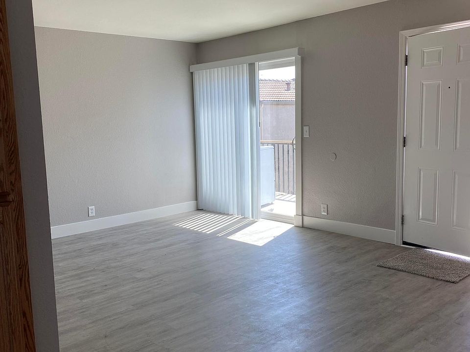 Living room, kitchen angle